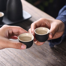 Load image into Gallery viewer, Japanese Sake Cup Set with Warmer- Mini Ceramic Sake set- 9 pcs Sake set- Black and White classic Sake Set
